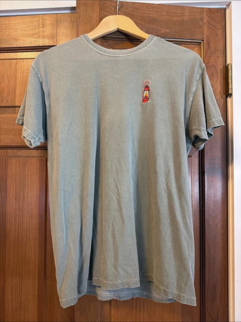 Unisex t-shirt comfort colors medium green with embroidered oil lamp camping